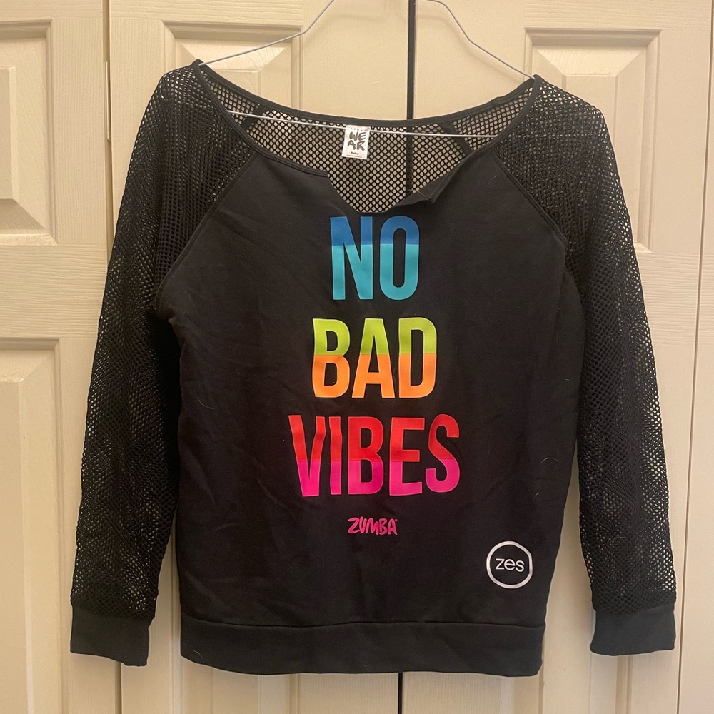 Zumba mesh Back and sleeved top. Women’s size small (spicy). No bad vibes.